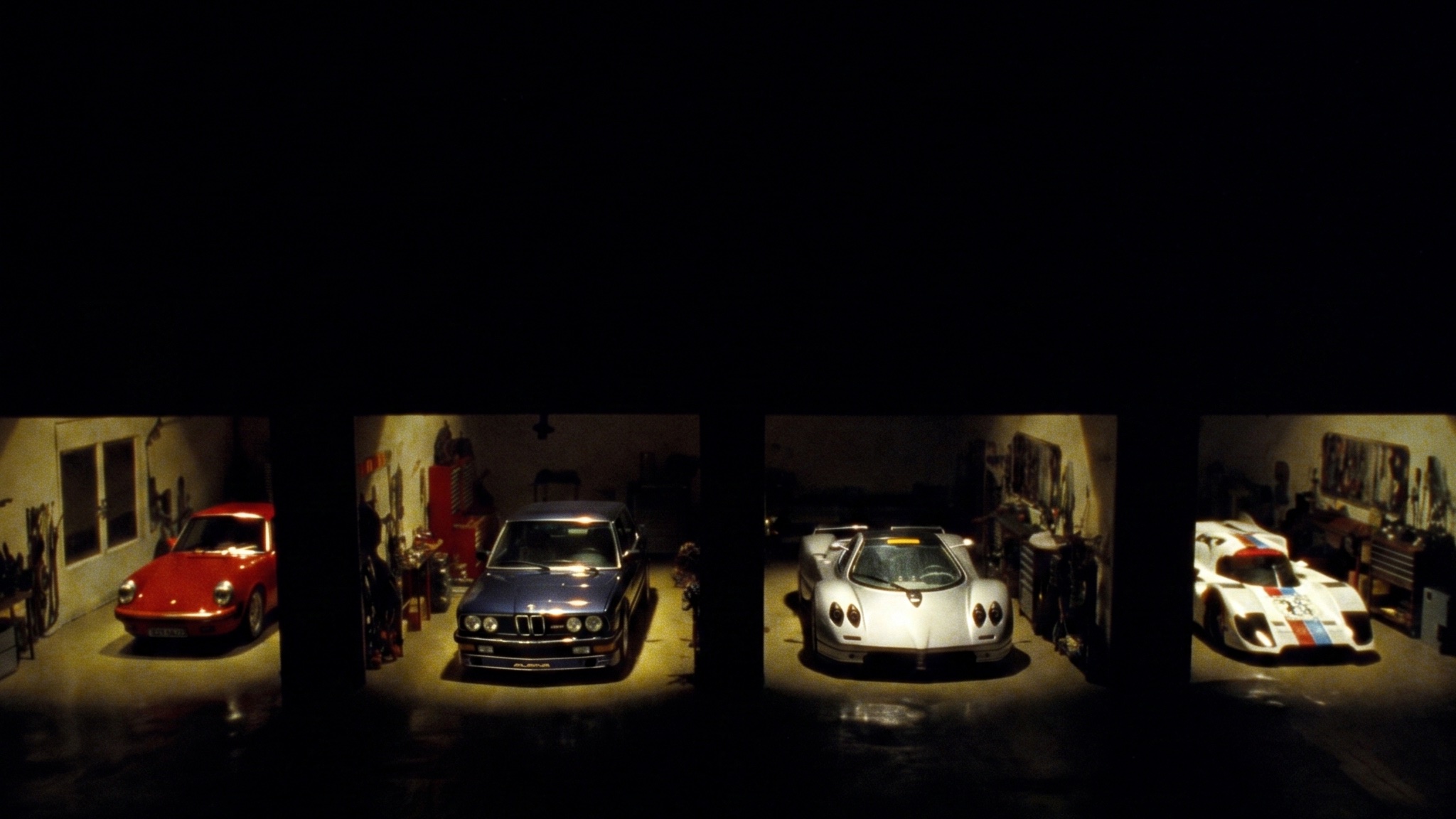 The garage interior — four cars, four stories
